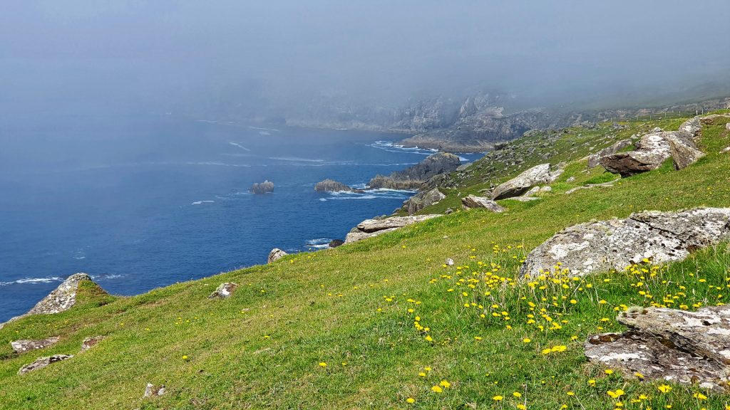 View of fog lifting over the Blasket Sound